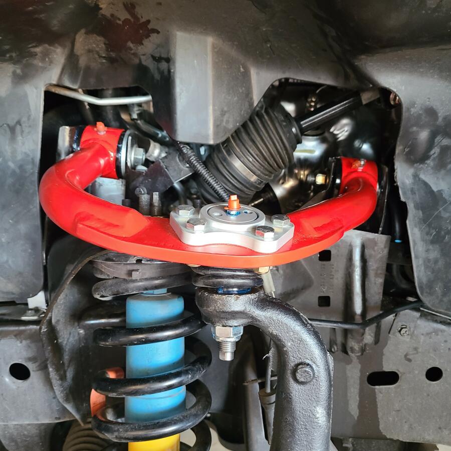 Are you tired of your upper control arms hitting the spring bucket on